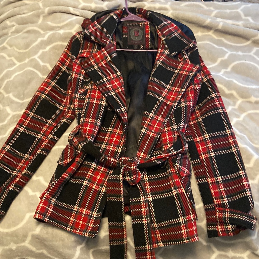 Red and black jacket.